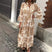 Vanira - Robe élégante à manches longues à fleurs avec volants