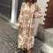 Vanira - Robe élégante à manches longues à fleurs avec volants