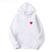Nikki – Sweat à capuche femme avec motif cœur et poches avant