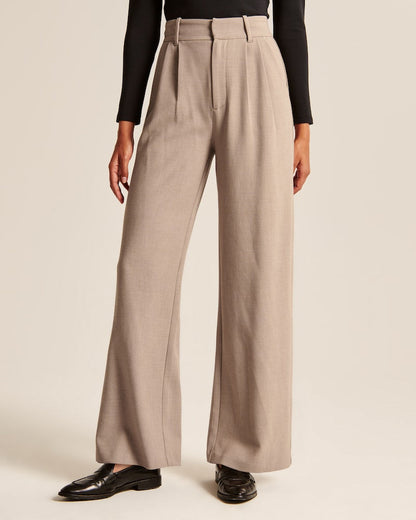 Caelira - Pantaloni beige a gamba larga