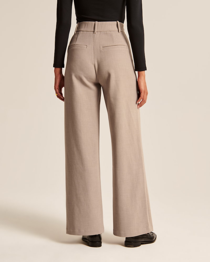 Caelira - Pantaloni beige a gamba larga