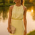 Élarine - Robe midi sans manches à col montant