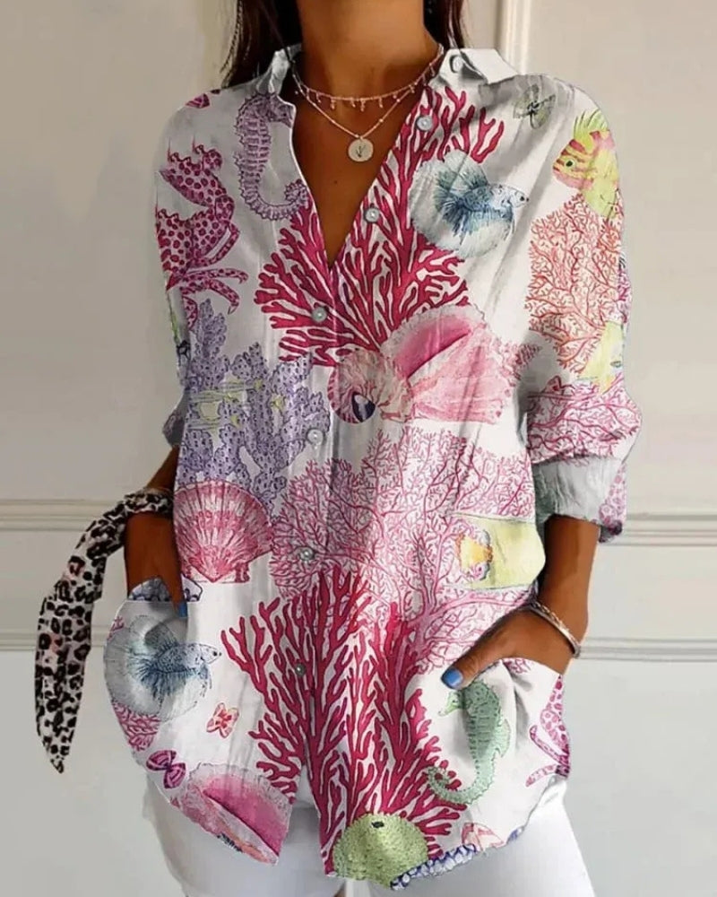 Virela - Damebluse med langærmet allover-print