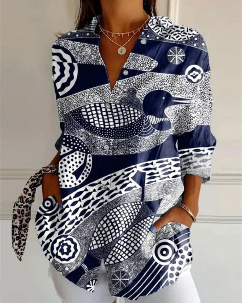 Virela - Damebluse med langærmet allover-print