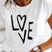 Solviera - T-shirt blanc à manches courtes imprimé pour femme